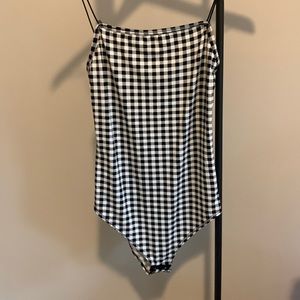 Checked black and white body suit size S